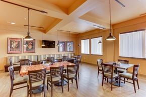 Billings apartment for rent - A dining room with a table surrounded by chairs.