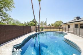 Glendale house for rent - A swimming pool with a FirstKey logo.