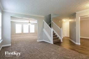 Indianapolis house for rent - the living room and entryway of an empty house