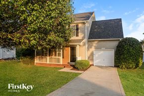 Huntersville house for rent - A house with a garage is shown in the image.
