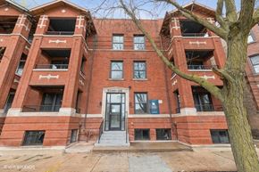Chicago apartment for rent - the front of a brick building with a door