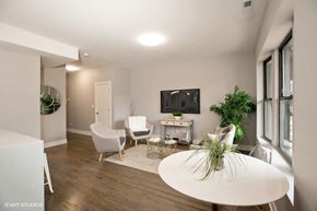 Chicago apartment for rent - a living room and dining room with a table and chairs