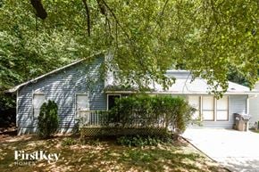 Acworth house for rent - a blue house with a porch and a tree