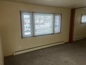 Fargo apartment for rent - A room with a window and a car parked outside.