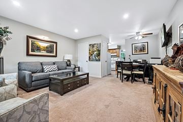 Bensenville apartment for rent - A living room with a grey couch and a painting on the wall.