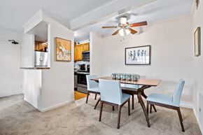Lisle apartment for rent - A dining room with a table and chairs.