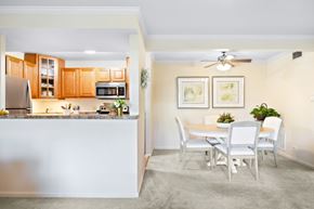 Lisle apartment for rent - A kitchen with a dining table and chairs.