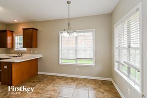 Arlington house for rent - a kitchen with a sink and a large window