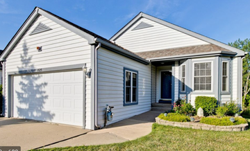 Gurnee apartment for rent - A two-story house with a white garage door.