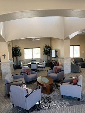 Sierra Vista apartment for rent - A living room with grey couches and a wooden coffee table.