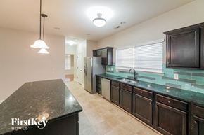 Newnan house for rent - a kitchen with a counter top and a sink