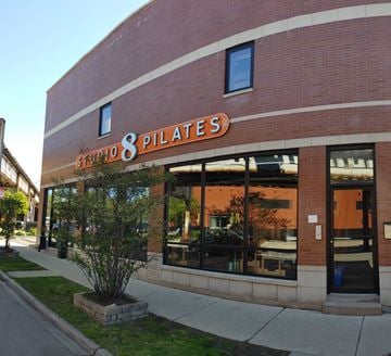Chicago apartment for rent - the exterior of a store with a brick building