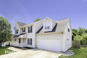 Winston-Salem house for rent - A two-story house with a garage is for sale.