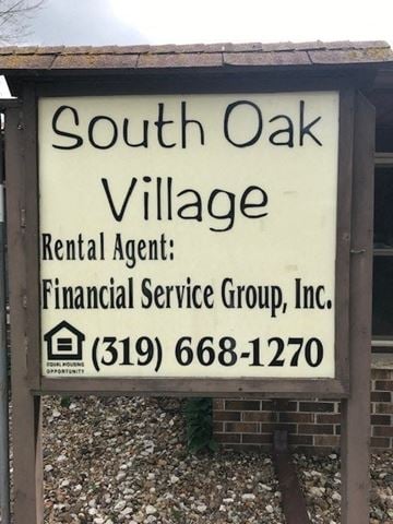 Ollie apartment for rent - a sign for south oak village is on the side of a building