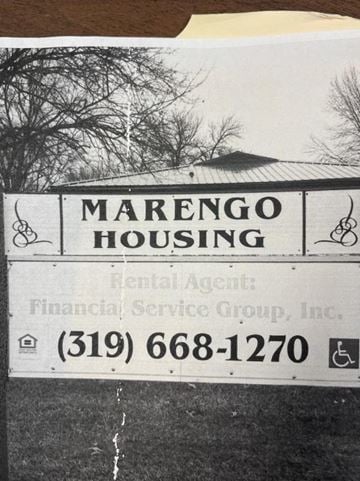 Marengo apartment for rent - a sign formarongo housing is shown in front of a building