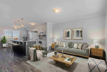 Regina apartment for rent - a living room and kitchen with a couch and a table