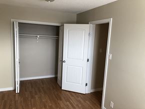 Prince Albert house for rent - an empty room with a closet and a door open
