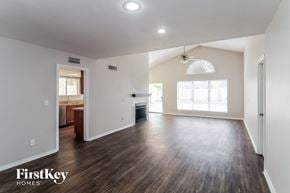 Phoenix house for rent - the living room and dining room of an empty house
