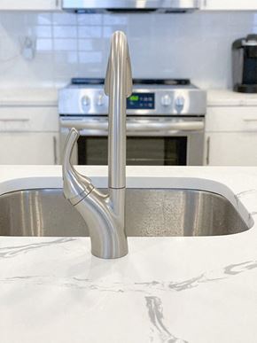 Stamford apartment for rent - a kitchen sink with a stainless steel faucet