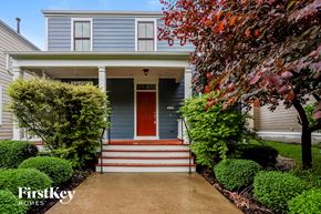Saint Charles house for rent - the front of a blue house with a red door