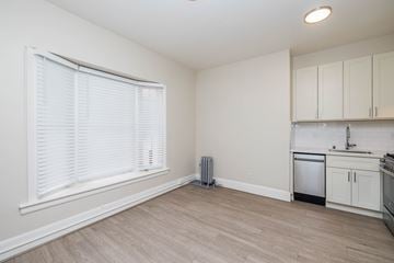 San Francisco apartment for rent - A kitchen area with a dishwasher and a sink.