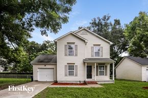 Jacksonville house for rent - A two-story house with a garage is for sale.