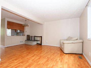 Maineville house for rent - A living room with a couch and a chair.