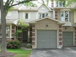 Guelph apartment for rent - a house with a garage door in front of it