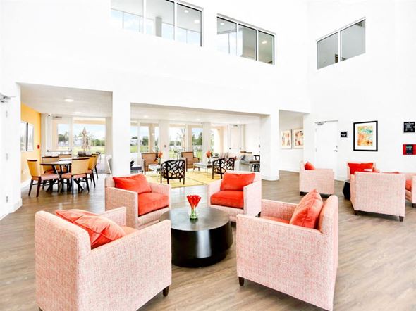 Riviera Beach apartment for rent - a living room with couches and chairs and a table