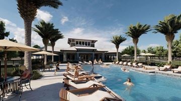 Bradenton apartment for rent - people are swimming in a pool at the resort