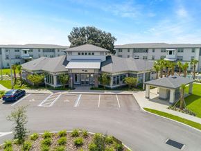 Dade City apartment for rent - an aerial view of an apartment building with parking lot