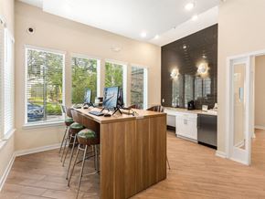 Dade City apartment for rent - a room with a desk with computers on it