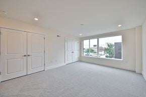 Philadelphia apartment for rent - an empty living room with white walls and a large window