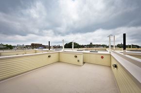 Philadelphia apartment for rent - the roof of a building with a cloudy sky in the background
