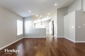 Plainfield house for rent - the living room and dining room with hardwood flooring