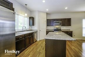 Lithopolis house for rent - an updated kitchen with granite countertops and stainless steel appliances