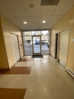 San Francisco apartment for rent - A hallway with a brown and tan carpet.