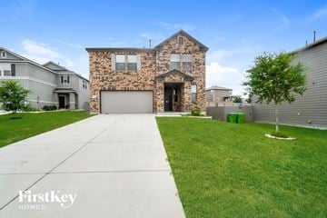 San Antonio house for rent - a stone house with a sidewalk in front of it