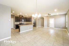 San Antonio house for rent - an open kitchen and living room with a large tile flooring