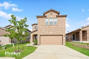San Antonio house for rent - a large brick house with a garage door