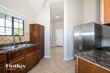 Balch Springs house for rent - the kitchen has granite counter tops and stainless steel appliances