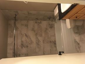 Prince Albert house for rent - a small bathroom with a shower and a toilet