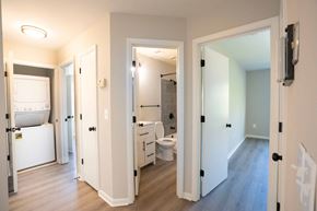 Annapolis house for rent - a renovated living room with a bathroom and a laundry room