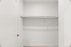 North Hollywood apartment for rent - a walk in closet with a white wall and a white shower curtain
