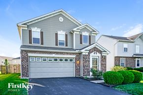 Blacklick house for rent - a house with a garage door in front of it