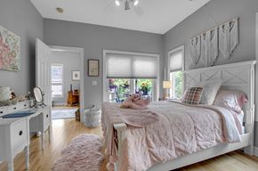 East Amherst apartment for rent - a bedroom with a bed and a dresser and a window