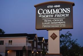 East Amherst apartment for rent - a sign that readscommons real offices luxury apartments