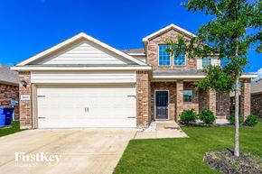 Princeton house for rent - a brick house with a white garage door