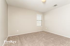 Princeton house for rent - the spacious living room has carpeting and a window