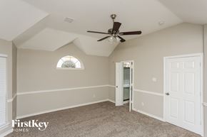 Fort Worth house for rent - the master bedroom has a ceiling fan and a closet